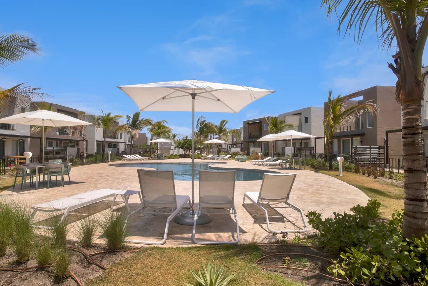 The Tides at Playa Caracol: buildings and pool